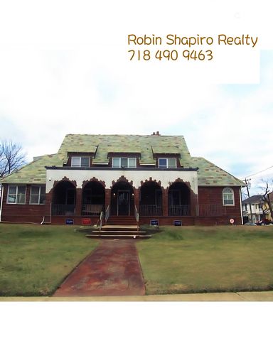  4 BR,  3.50 BTH  Colonial style home in Neponsit